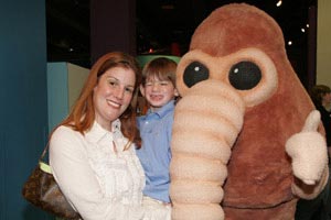 Rebecca Stoll and son with alien.
