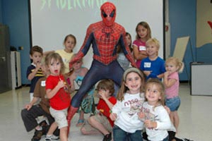 Spider-Man hangs out with the kids.